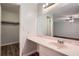 Main bathroom features vanity, expansive mirror and access to the large main bedroom at 1515 Barrier Rd, Marietta, GA 30066