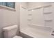 Clean and bright bathroom features a shower/tub combo with a white tile surround at 1515 Barrier Rd, Marietta, GA 30066