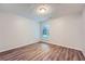 Cozy bedroom with ample natural light and wood-look flooring, providing a comfortable space at 1515 Barrier Rd, Marietta, GA 30066