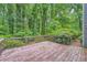 Spacious wooden deck overlooking lush backyard at 1515 Barrier Rd, Marietta, GA 30066