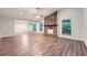 Spacious living room with high ceilings, hardwood floors, and a stone fireplace at 1515 Barrier Rd, Marietta, GA 30066