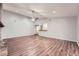 Bright and spacious living room with hardwood floors and a large fireplace at 1515 Barrier Rd, Marietta, GA 30066