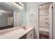 Main bathroom featuring an extended vanity and access to a separate shower/tub area at 1515 Barrier Rd, Marietta, GA 30066