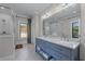 Beautiful bathroom featuring double sink with marble countertops and a large glass shower at 2373 Sagamore Hills Dr, Decatur, GA 30033