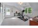 Bright exercise room with gym equipment, natural light, and neutral walls at 2373 Sagamore Hills Dr, Decatur, GA 30033