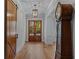 Bright foyer showcasing hardwood floors and a traditional grandfather clock at 2373 Sagamore Hills Dr, Decatur, GA 30033