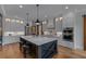 Bright kitchen with large island, stainless appliances, pendant lighting and ample cabinet storage at 2373 Sagamore Hills Dr, Decatur, GA 30033