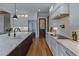 A kitchen with a large island, stainless appliances and stone countertops for a high-end finish at 2373 Sagamore Hills Dr, Decatur, GA 30033