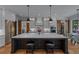 A spacious kitchen with stainless steel appliances, a large island and hardwood floors throughout at 2373 Sagamore Hills Dr, Decatur, GA 30033