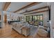 Open living room with hardwood floors, fireplace and access to a kitchen and backyard at 2373 Sagamore Hills Dr, Decatur, GA 30033