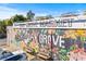 Eye-catching mural on Oak Grove Market with floral designs, benches, and convenient street parking at 2373 Sagamore Hills Dr, Decatur, GA 30033