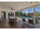 Outdoor patio with wooden deck, ceiling fans, a view of the backyard, pool, and lawn at 2373 Sagamore Hills Dr, Decatur, GA 30033