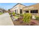 View of the Madison Yards shopping area featuring landscaped flowerbeds and brick exterior at 260 Estoria St, Atlanta, GA 30316