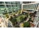 Aerial view highlights the community's green spaces, pool, and proximity to city buildings at 40 12Th Ne St # 803, Atlanta, GA 30309