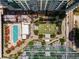 Bird's eye view showcasing the community's pool, green spaces, and building rooftops at 40 12Th Ne St # 803, Atlanta, GA 30309