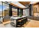 Beautiful amenity kitchen featuring stone countertops, ample counter space, and natural light at 40 12Th Ne St # 803, Atlanta, GA 30309