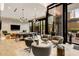 Comfortable seating arrangement in the open-concept living room with access to an outdoor patio at 40 12Th Ne St # 803, Atlanta, GA 30309