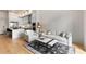 Open floorplan with a modern kitchen, living room, and hardwood floors at 40 12Th Ne St # 803, Atlanta, GA 30309