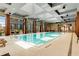Indoor pool offers natural light and city views, with ample space for swimming laps or relaxing at 40 12Th Ne St # 803, Atlanta, GA 30309