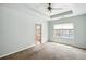 Bedroom with carpet and windows offering natural light at 5019 Lower Elm St, Atlanta, GA 30349