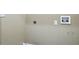 Close up of a blank wall with a dryer hookup in a laundry room at 5019 Lower Elm St, Atlanta, GA 30349