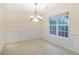 Traditional dining room featuring natural light at 75 Saltcreek Pt, Sugar Hill, GA 30518