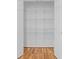 This open closet features wire shelving and hardwood floors for ample storage space at 2889 Macon Sw Dr, Atlanta, GA 30354