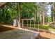 Outdoor shed with a car port and a concrete patio at 2889 Macon Sw Dr, Atlanta, GA 30354
