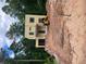 Modern two-story home with sleek black framed windows and a yellow exterior during the construction phase at 2918 Level Ridge Rd, Atlanta, GA 30354