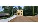 A modern two-story home with a spacious driveway and attached garage at 2918 Level Ridge Rd, Atlanta, GA 30354