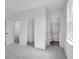Spacious bedroom with multiple closets and an en-suite bathroom showcasing modern design at 3269 Shirecrest Ln, Dacula, GA 30019