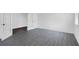 This versatile space boasts luxury vinyl plank flooring and an attached office or playroom at 3269 Shirecrest Ln, Dacula, GA 30019