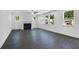 Spacious living room with a fireplace, large windows, and laminate flooring at 3269 Shirecrest Ln, Dacula, GA 30019
