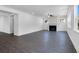 Spacious living room with a fireplace, large windows, and laminate flooring at 3269 Shirecrest Ln, Dacula, GA 30019