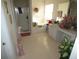 Bright bathroom featuring a shower, tub, vanity, and plenty of natural light at 6179 Swabia Ln, Stone Mountain, GA 30087