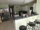Bright kitchen with stainless steel appliances, a breakfast bar, and ample counter space at 6179 Swabia Ln, Stone Mountain, GA 30087