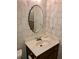 Bathroom vanity with a sink and mirror at 1818 Brandy Woods Se Dr, Conyers, GA 30013