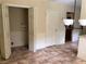 Open concept mud room or utility room featuring tile flooring and laundry hookups at 1818 Brandy Woods Se Dr, Conyers, GA 30013