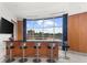 Stylish bar area with modern stools, sleek countertops, and scenic city views at 2881 Peachtree Ne Rd # 1102, Atlanta, GA 30305