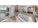 Luxurious bathroom featuring a large tub and separate shower at 2881 Peachtree Ne Rd # 1102, Atlanta, GA 30305