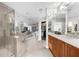 Bright bathroom with soaking tub, glass shower, and vanity at 2881 Peachtree Ne Rd # 1102, Atlanta, GA 30305