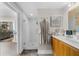 Modern bathroom featuring a glass-enclosed shower, double vanity, and stylish decor at 2881 Peachtree Ne Rd # 1102, Atlanta, GA 30305