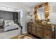 An interior shot from a bedroom with carpet and an antique wood cabinet at 2881 Peachtree Ne Rd # 1102, Atlanta, GA 30305