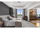 Stylish bedroom with a comfortable king-sized bed, natural light, and a connecting room at 2881 Peachtree Ne Rd # 1102, Atlanta, GA 30305