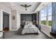 Cozy bedroom with tray ceiling, large window, and neutral color palette at 2881 Peachtree Ne Rd # 1102, Atlanta, GA 30305