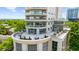 Exterior of condo with patio, seating area and manicured landscaping at 2881 Peachtree Ne Rd # 1102, Atlanta, GA 30305