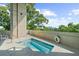Rooftop spa pool surrounded by lush greenery, offering privacy and relaxation with a picturesque city skyline at 2881 Peachtree Ne Rd # 1102, Atlanta, GA 30305