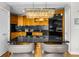 An eat-in kitchen island with granite countertops, wood cabinets, and stainless steel appliances at 2881 Peachtree Ne Rd # 1102, Atlanta, GA 30305