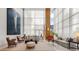 Bright and spacious living room features tall windows and natural light at 2881 Peachtree Ne Rd # 1102, Atlanta, GA 30305
