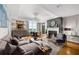 Inviting living area with fireplace, hardwood flooring, a dining area with views, and comfortable seating arrangement at 2881 Peachtree Ne Rd # 1102, Atlanta, GA 30305